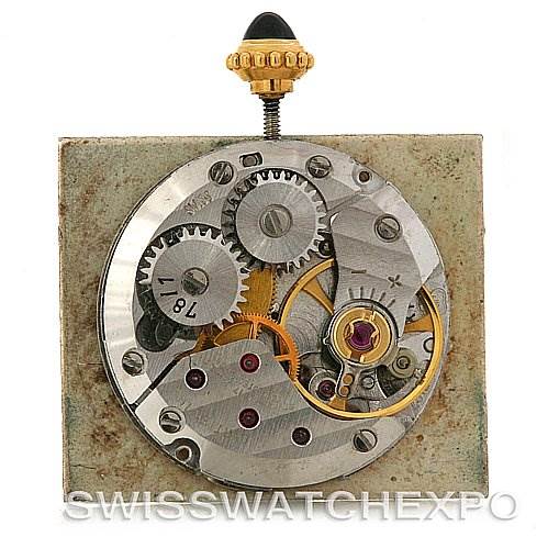 This image shows the inner mechanical movement of the Cartier Tank Classic Yellow Gold White Dial Yellow Gold White Dial watch, viewed from a top-down angle.