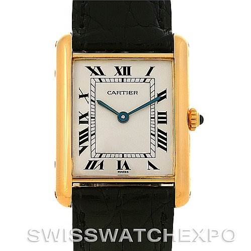 This image shows a front view of the Cartier Tank Classic Yellow Gold White Dial Yellow Gold White Dial watch, highlighting its rectangular face, Roman numerals, and leather strap.