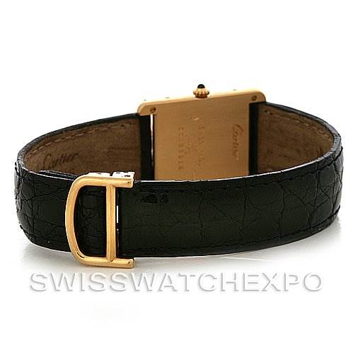 The image shows the back and side of the Cartier Tank Classic Yellow Gold White Dial Yellow Gold White Dial watch, featuring its black leather strap and gold clasp.