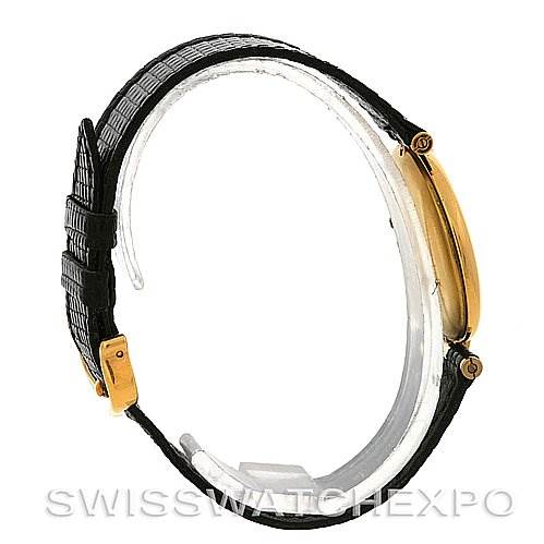 This image shows a side profile of the Tank Classic model by Cartier, highlighting the strap, buckle, and case.