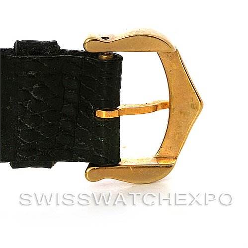 This image shows a side view of the buckle and part of the strap for a Cartier Tank Classic Yellow Gold Black Dial Yellow Gold Black Dial watch.