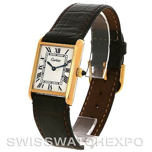 This image shows a Cartier Tank Classic Yellow Gold White Dial Yellow Gold White Dial watch, featuring its face, leather strap, and gold-tone rectangular case, in a slightly angled view.
