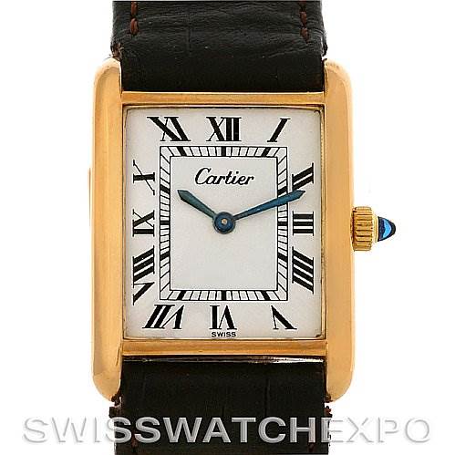 The image shows a front view of the Cartier Tank Classic Yellow Gold White Dial Yellow Gold White Dial watch, highlighting its face, Roman numeral dial, and crown.