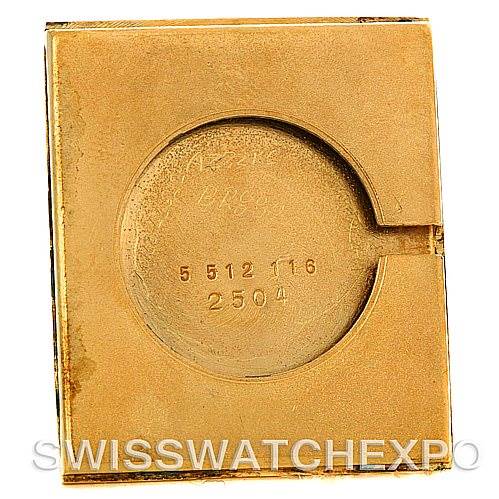 The image shows the back casing of a Cartier Tank Classic Men's Yellow Gold White Dial Men's Yellow Gold White Dial watch.