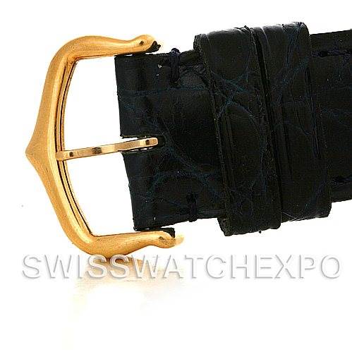 This image shows the gold buckle and black leather strap of a Cartier Tank Classic Yellow Gold White Dial Yellow Gold White Dial model watch.