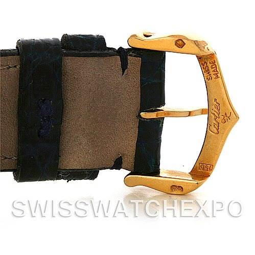 This image shows a side view of the leather strap and gold buckle of a Tank Classic model by Cartier.