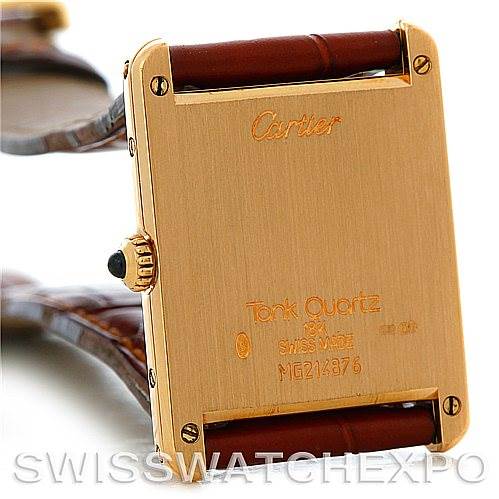 This image shows the back of a Cartier Tank Classic Men's Yellow Gold White Dial Men's Yellow Gold White Dial watch, including the case back and leather straps.