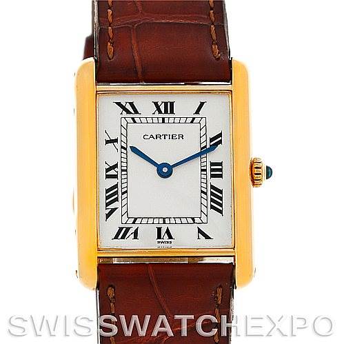 This image shows a frontal view of the Cartier Tank Classic Men's Yellow Gold White Dial Men's Yellow Gold White Dial watch, highlighting its rectangular dial, Roman numerals, and leather strap.