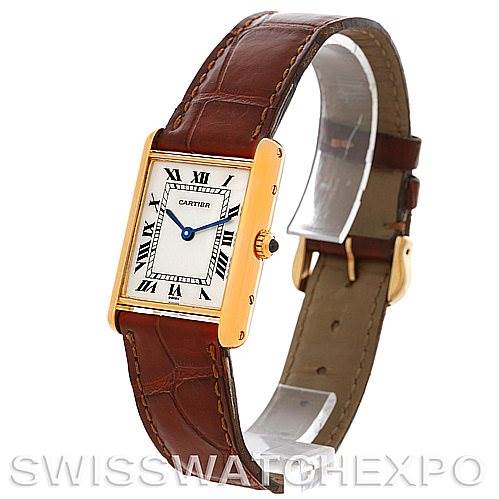 This image shows a Cartier Tank Classic Men's Yellow Gold White Dial Men's Yellow Gold White Dial watch in a front angle, displaying the face, leather strap, and gold casing.