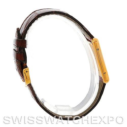 This image shows a side profile of the Tank Classic watch by Cartier, depicting the strap, buckle, and case side.