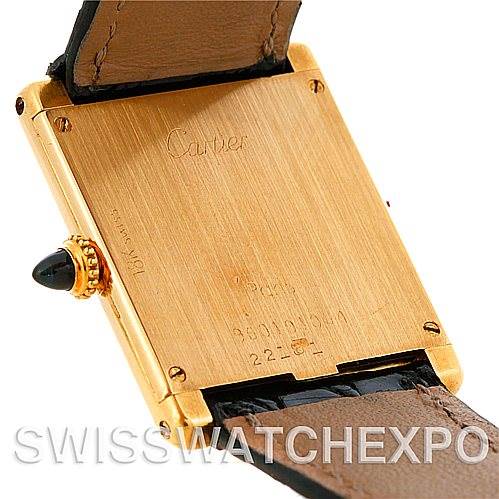 The image shows the back case and part of the strap of a Tank Classic model by Cartier, viewed from the back angle.