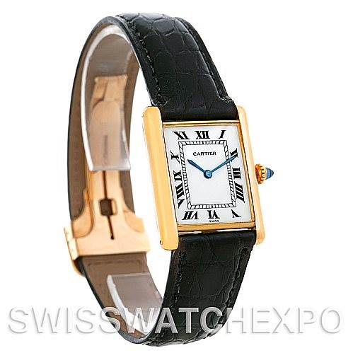 The image shows a side angle of the Cartier Tank Classic Men's Yellow Gold White Dial Men's Yellow Gold White Dial watch, highlighting the face, black leather band, and gold casing.