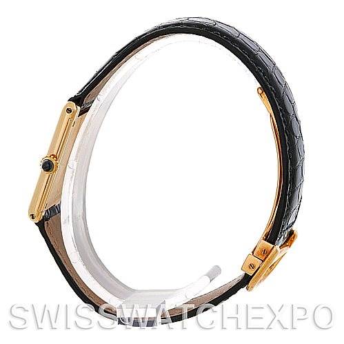 Side view of the Cartier Tank Classic Men's Yellow Gold White Dial Men's Yellow Gold White Dial watch, showcasing the black leather strap and gold case.