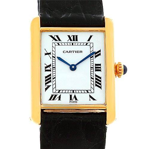 This image shows the Cartier Tank Classic Men's Yellow Gold White Dial Men's Yellow Gold White Dial watch from a front-facing angle, displaying the dial, hands, and part of the strap.