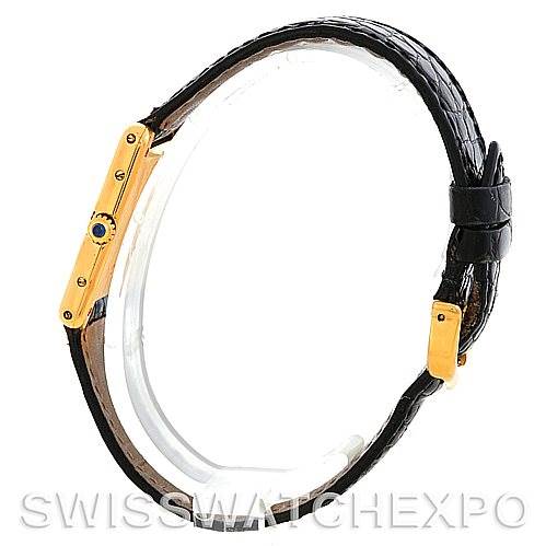 This image shows the side view of a Cartier Tank Classic Men's Yellow Gold White Dial Men's Yellow Gold White Dial watch, featuring its slim profile, strap, and crown.