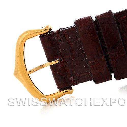 The image shows a close-up of the buckle and leather strap of a Cartier Tank Classic MG215914 Men's Yellow Gold White Dial MG215914 Men's Yellow Gold White Dial watch.