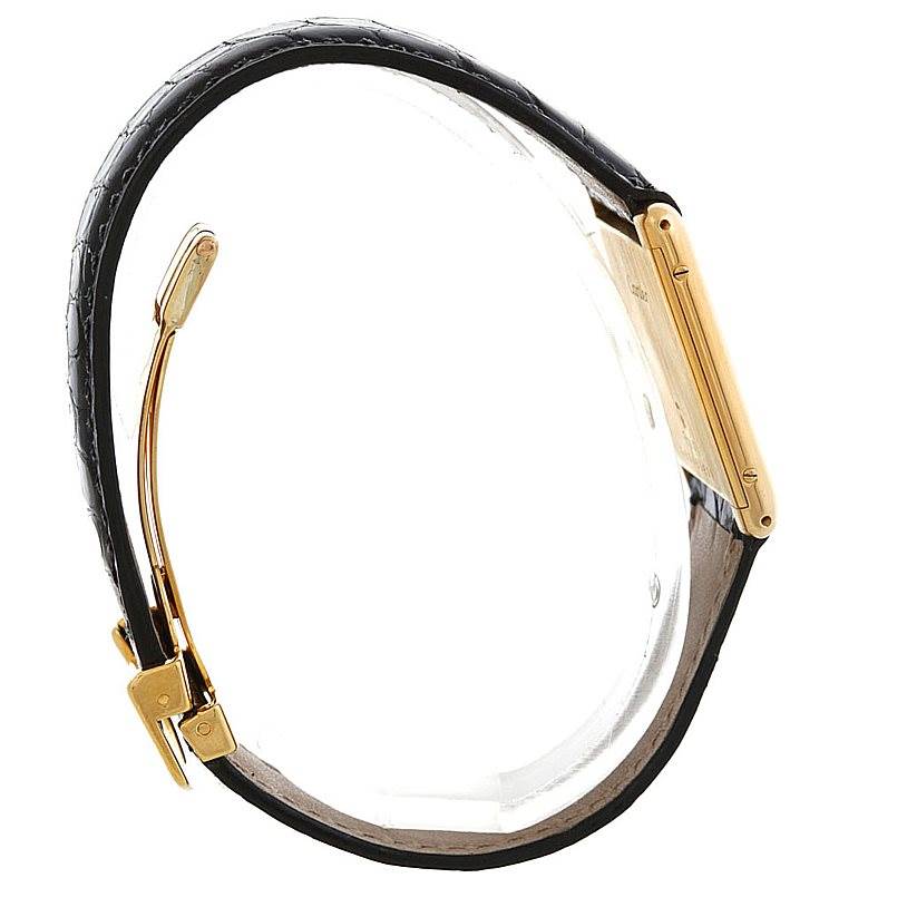 The image shows a side profile view of the Cartier Tank Classic Men's Yellow Gold White Dial Men's Yellow Gold White Dial watch, highlighting the strap and case.