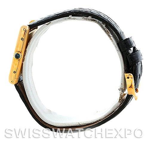 The image shows a side view of the Cartier Tank Classic Men
s Yellow Gold Silver Dial Men
s Yellow Gold Silver Dial model, highlighting the watch case and leather strap.