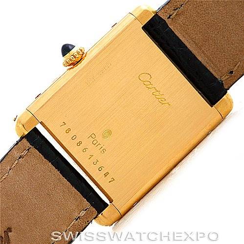 This image shows the back of the Cartier Tank Classic Men's Yellow Gold White Dial Men's Yellow Gold White Dial watch, displaying the case and the leather straps.