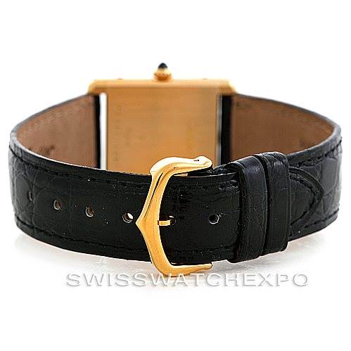 This image shows the back of a Tank Classic watch by Cartier, highlighting the clasp and black leather strap.