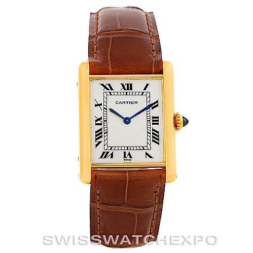 This image shows a frontal view of a Cartier Tank Classic Men's Yellow Gold Silver Dial Men's Yellow Gold Silver Dial watch with its rectangular dial and brown leather strap.