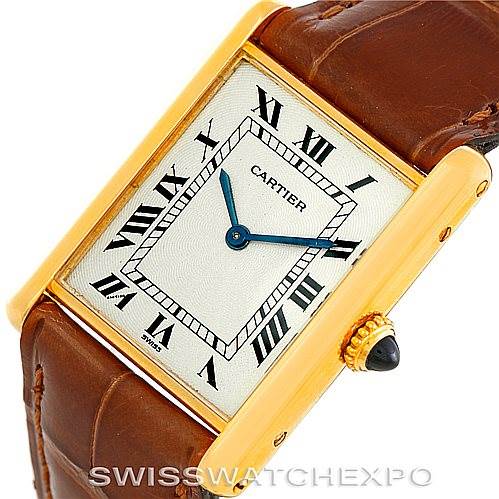 This image shows the Tank Classic model by Cartier at an angled view, highlighting its rectangular face, Roman numeral markers, and leather strap.