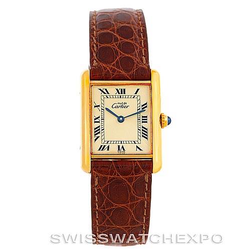This image shows a front view of the Cartier Tank Classic W002953 Men's Yellow Gold Champagne Dial W002953 Men's Yellow Gold Champagne Dial watch with a brown leather strap and gold case.