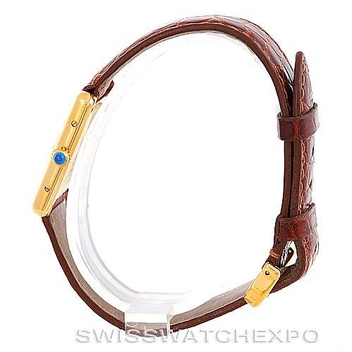 The image shows a Cartier Tank Classic W002953 Men's Yellow Gold Champagne Dial W002953 Men's Yellow Gold Champagne Dial watch in a side profile, highlighting the crown, casing, and brown leather strap.