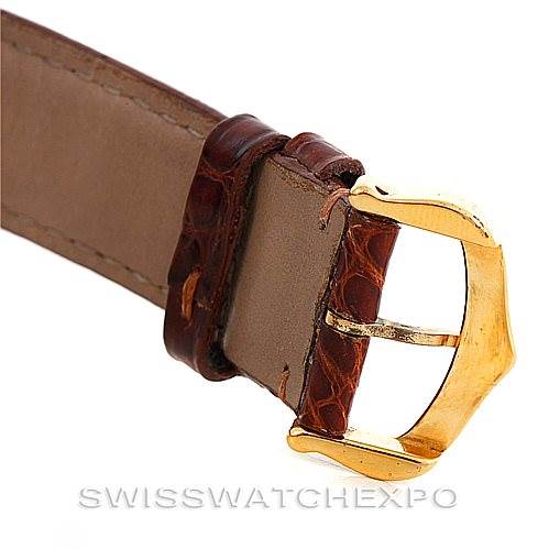 The image shows a close-up of the clasp and leather strap of a Cartier Tank Classic W002953 Men's Yellow Gold Champagne Dial W002953 Men's Yellow Gold Champagne Dial watch.