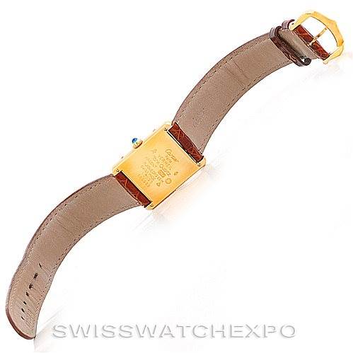 The image shows the back view of a Cartier Tank Classic W002953 Men's Yellow Gold Champagne Dial W002953 Men's Yellow Gold Champagne Dial watch, displaying the leather strap and gold case.