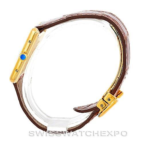 Side view of the Cartier Tank Classic W002953 Men's Yellow Gold White Dial W002953 Men's Yellow Gold White Dial watch, highlighting the crown with a blue cabochon and the brown leather strap.