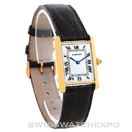 This Cartier Tank Classic 7808613746 Men's Yellow Gold White Dial 7808613746 Men's Yellow Gold White Dial watch is shown at a slight angle displaying its square face, Roman numeral markers, gold casing, and leather strap.