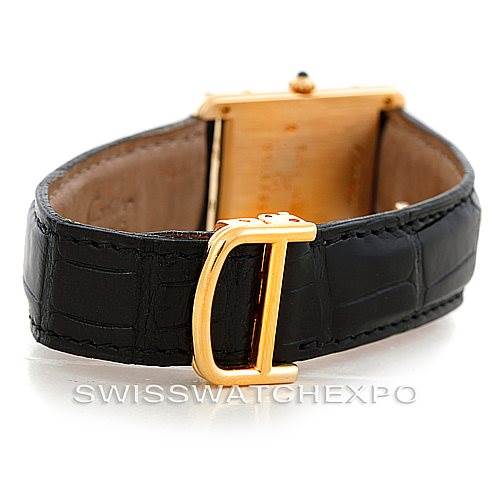 This image of the Cartier Tank Classic Men's Yellow Gold Silver Dial Men's Yellow Gold Silver Dial watch shows the back side, including the strap and buckle, from a rear angle.