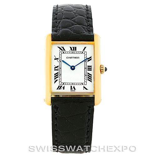 The image shows a front view of the Cartier Tank Classic Men's Yellow Gold White Dial Men's Yellow Gold White Dial model watch, displaying its rectangular face, Roman numerals, and black leather strap.