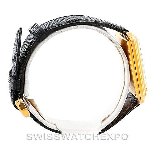 This side view image shows the Cartier Tank Classic Men's Yellow Gold White Dial Men's Yellow Gold White Dial model watch, highlighting its gold casing and black leather strap.