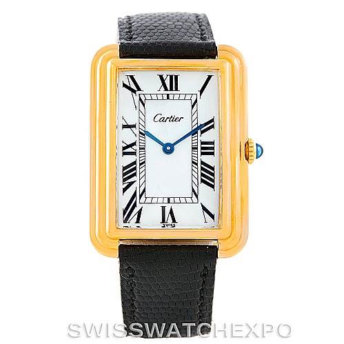 This image shows a front view of the Cartier Tank Classic Men's Yellow Gold White Dial Men's Yellow Gold White Dial model watch, highlighting its gold case, black strap, and Roman numeral dial.