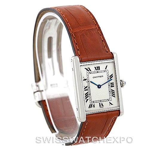 This image shows a Cartier Tank Classic Men
s Platinum Silver Dial Men
s Platinum Silver Dial watch angled to display the face, brown leather strap, and part of the side bezel.