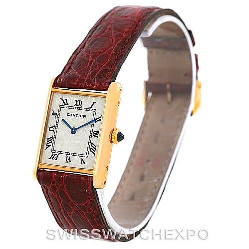 The image shows a Cartier Tank Classic 960655124 Men's Yellow Gold Silver Dial 960655124 Men's Yellow Gold Silver Dial watch at a slight angle, highlighting its brown leather strap and rectangular face with Roman numerals.
