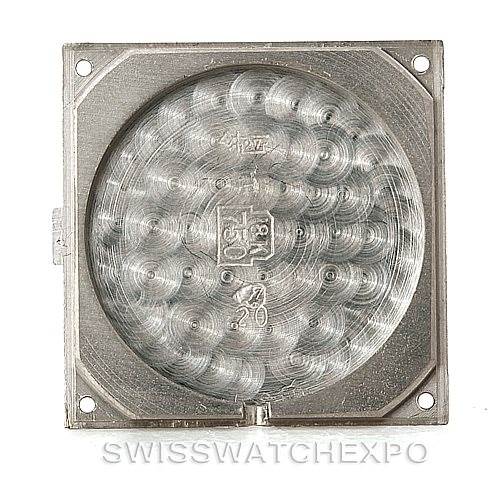 This image shows the inside case back of a Cartier Tank Classic Men's White Gold White Dial Men's White Gold White Dial watch, viewed from above.