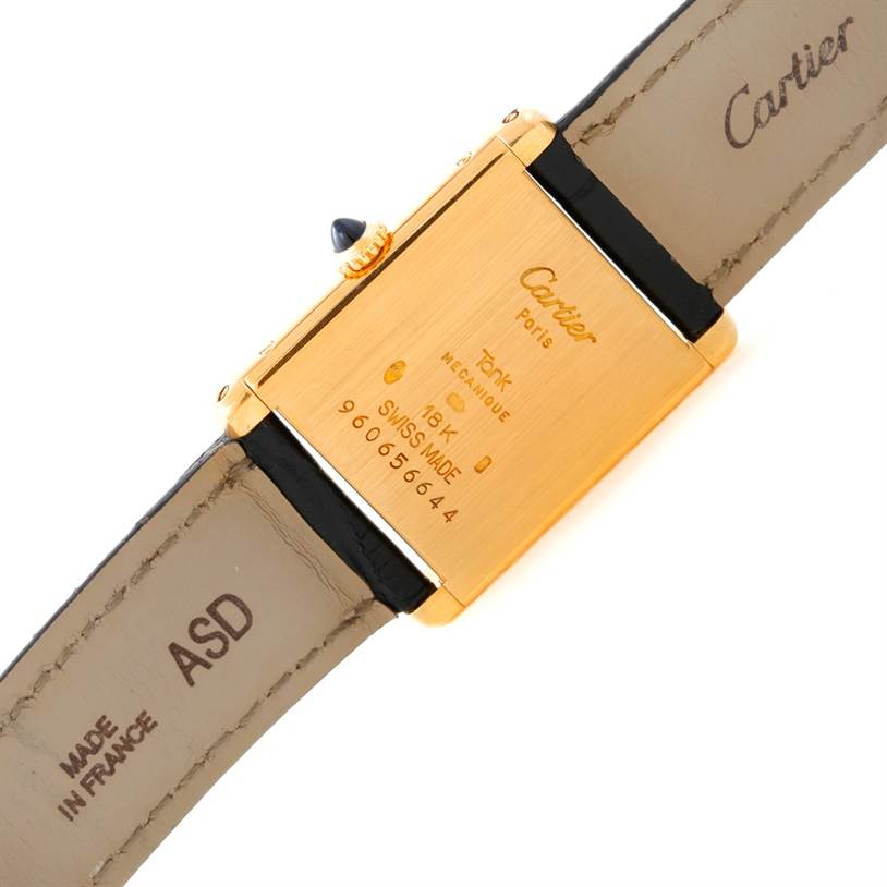 This image shows the back case and leather strap of a Cartier Tank Classic Men's Yellow Gold Beige Dial Men's Yellow Gold Beige Dial watch.