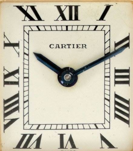 This image shows a close-up, frontal view of the dial of a Cartier Tank Classic Women's Yellow Gold White Dial Women's Yellow Gold White Dial watch.