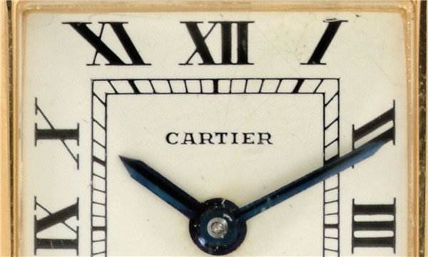 The image shows a close-up of the dial and hands of the Cartier Tank Classic Women's Yellow Gold White Dial Women's Yellow Gold White Dial watch.