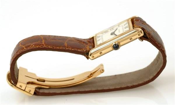 Side view of the Cartier Tank Classic Women's Yellow Gold White Dial Women's Yellow Gold White Dial watch showing the brown leather strap and gold clasp.