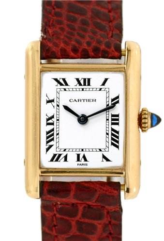 This image shows a frontal view of the Cartier Tank Classic Women's Yellow Gold White Dial Women's Yellow Gold White Dial watch, displaying its dial, Roman numerals, gold case, and red leather strap.