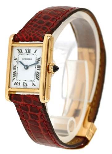This Cartier Tank Classic Women's Yellow Gold White Dial Women's Yellow Gold White Dial model watch is shown at an angle displaying the face, red leather strap, and side crown.