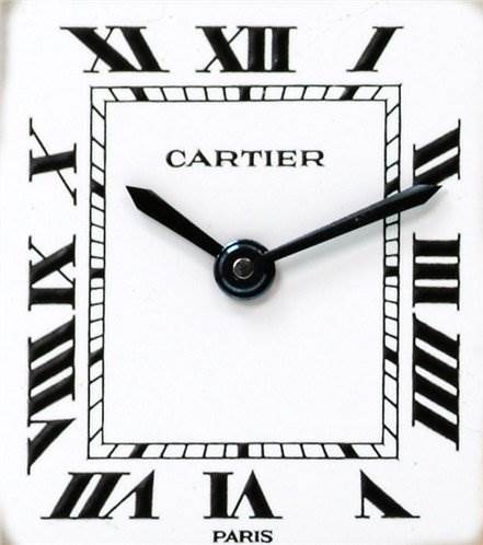 This image shows the face of the Cartier Tank Classic Women's Yellow Gold White Dial Women's Yellow Gold White Dial watch, highlighting Roman numerals and the brand's logo at the center.