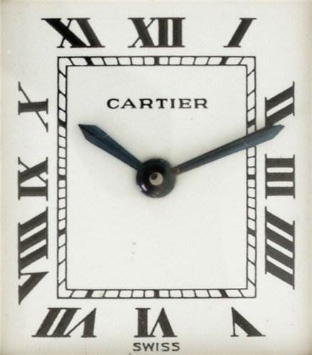 This image shows a close-up of the dial of a Cartier Tank Classic Women's Yellow Gold White Dial Women's Yellow Gold White Dial watch, highlighting its Roman numerals and hands.