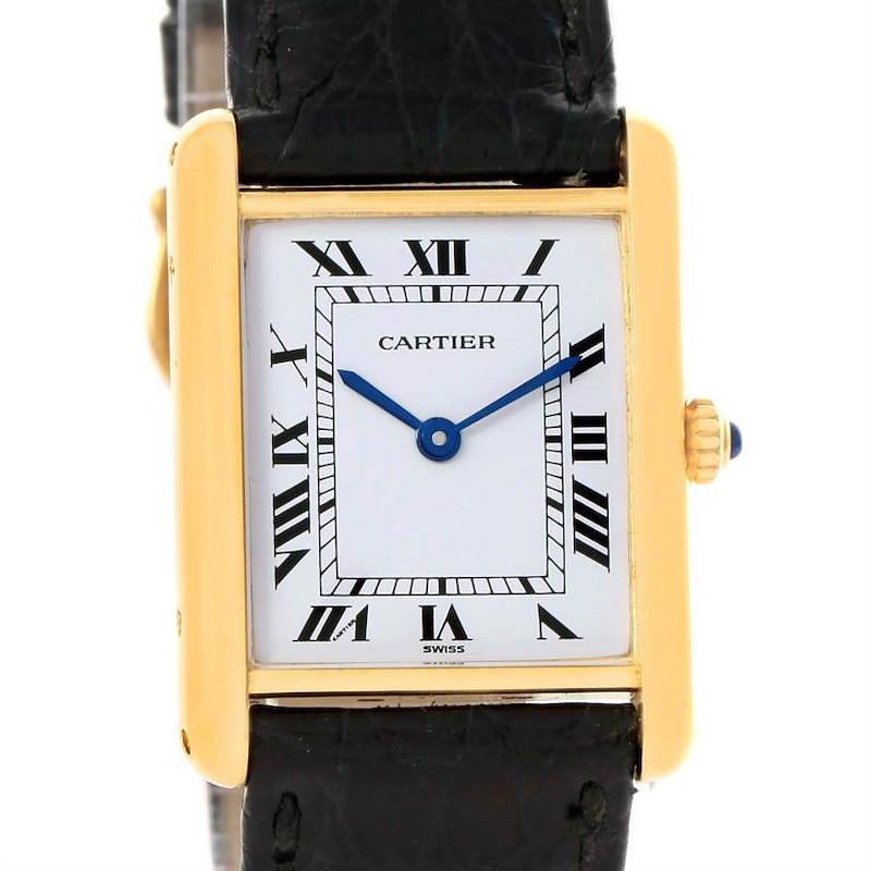 The image shows a front view of the Cartier Tank Classic watch, detailing its rectangular face, Roman numerals, and leather strap.