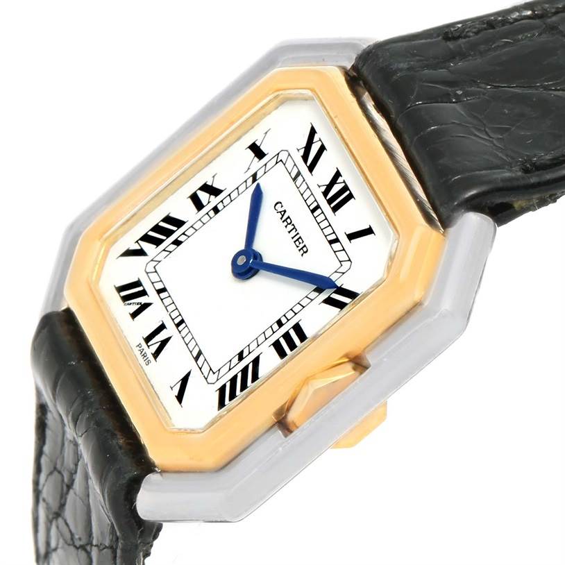 The image shows a close-up of a Cartier Tank Classic Women's Yellow Gold White Dial Women's Yellow Gold White Dial watch face and part of its leather strap at an angle.