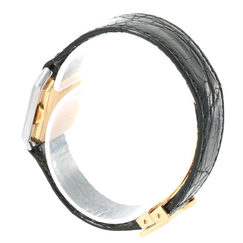 Side view of the Cartier Tank Classic Women's Yellow Gold White Dial Women's Yellow Gold White Dial watch, showing the leather strap and part of the metal case.